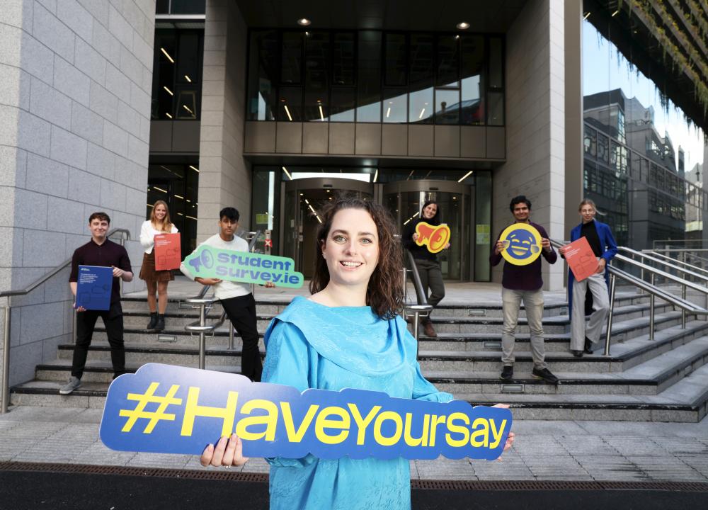 Senator Annie Hoey and six students holding signs